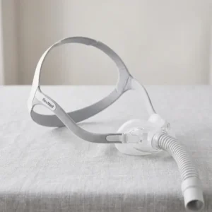ResMed AirFit N30 nasal cradle CPAP mask on a user showing the minimalist under-the-nose design